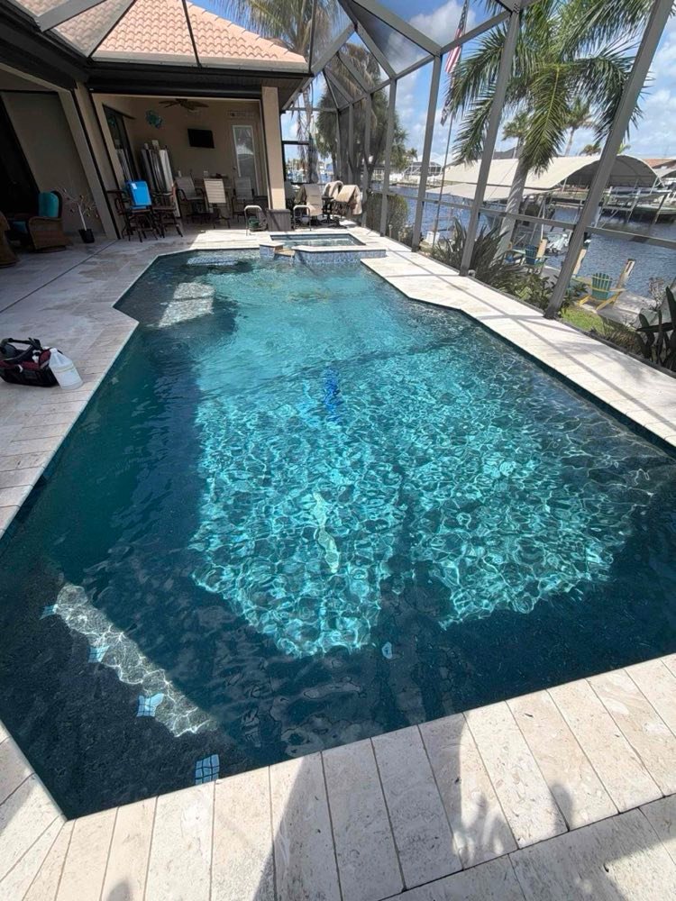 Screened pool with clear water and clean waterline tile