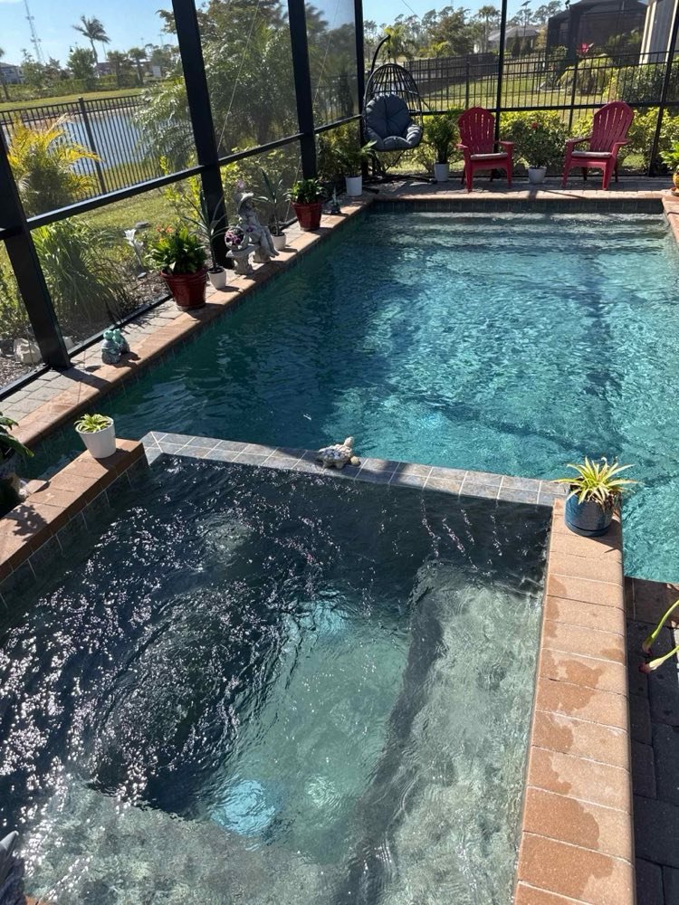 Clear pool with clean tile line and skimmed surface